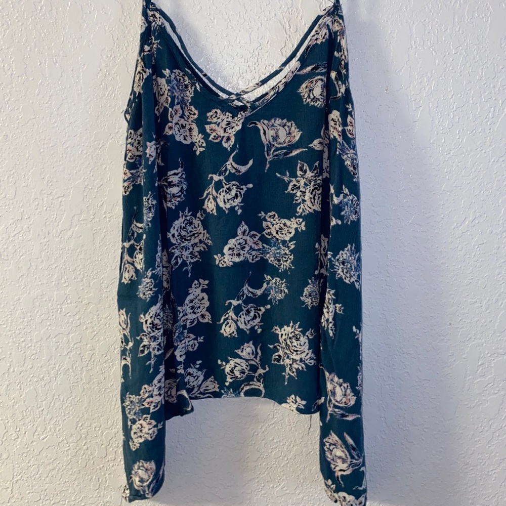 Asymmetrical floral tank top.